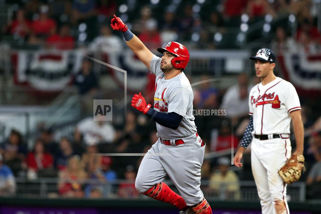 Butch Dill St. Louis Cardinals' Juan Yepez, left, celebrates after hitting a home run in the fifth inning of a baseball game against the Atlanta Braves, Monday, July 4, 2022, in Atlanta. (AP Photo/Butch Dill)