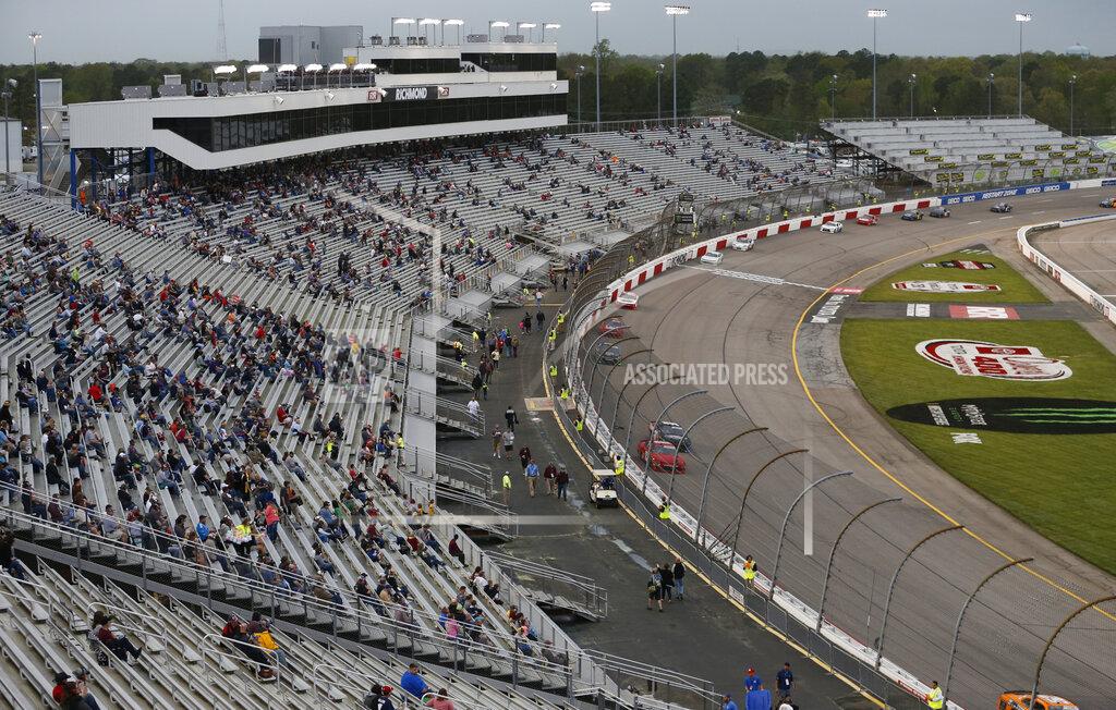 Steve Helber Fans watch the start of the NASCAR Xfinity Series auto race at Richmond Raceway in Richmond, Va., Friday, April 12, 2019. (AP Photo/Steve Helber)
