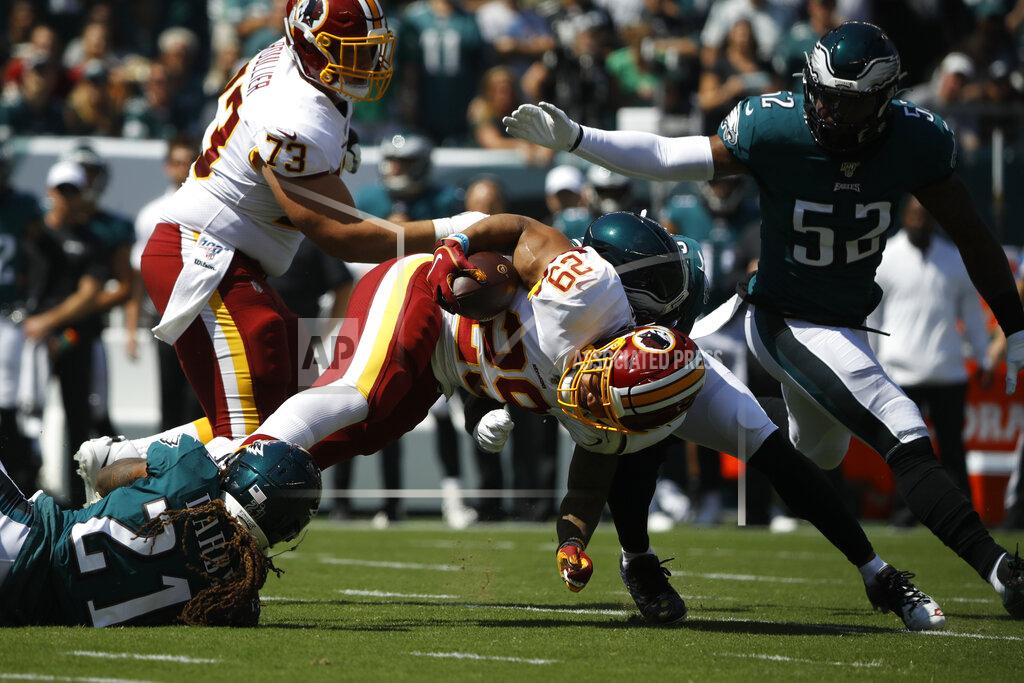Matt Rourke Washington Redskins' Derrius Guice (29) is tackled by Philadelphia Eagles' Rodney McLeod (23) and Ronald Darby (21) during the first half of an NFL football game, Sunday, Sept. 8, 2019, in Philadelphia. (AP Photo/Matt Rourke)