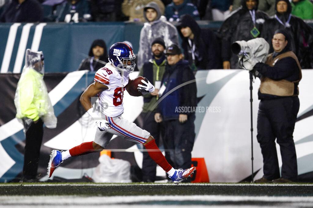 Matt Rourke New York Giants' Darius Slayton scores a touchdown during the first half of an NFL football game against the Philadelphia Eagles, Monday, Dec. 9, 2019, in Philadelphia. (AP Photo/Matt Rourke)