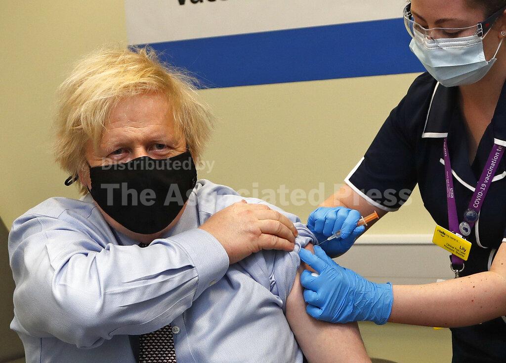 Just over half of UK adults have gotten at least one dose of the COVID-19 vaccine