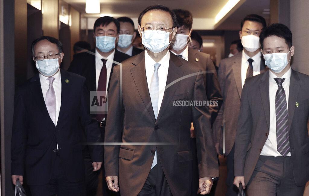 Lee Jin-Wook Yang Jiechi, center, a top Chinese official in charge of diplomatic affairs, arrives to meet with South Korean National Security Council Chairman Suh Hoon at a hotel in Busan, South Korea, Saturday, Aug. 22, 2020. The meeting between Yang and Suh are expected to discuss Chinese President Xi Jinping's visit to South Korea this year. (Lee Jin-wook/Yonhap via AP)