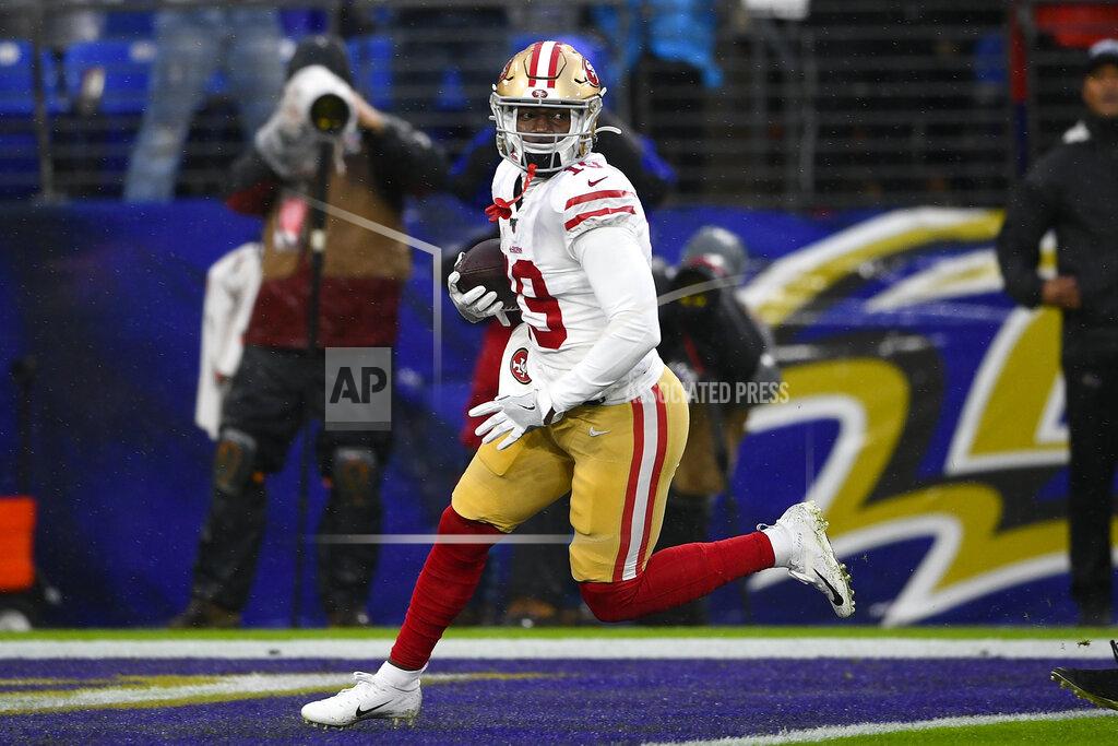 Nick Wass San Francisco 49ers wide receiver Deebo Samuel (19) scores a touchdown against the Baltimore Ravens in the first half of an NFL football game, Sunday, Dec. 1, 2019, in Baltimore, Md. (AP Photo/Nick Wass)