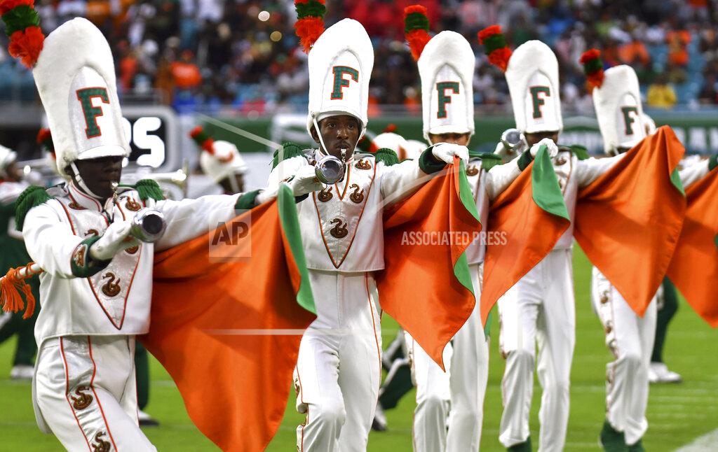Jim Rassol The Florida A&M Marching 100 perform during halftime of an NCAA college football game against Jackson State, Sunday, Sept. 5, 2021, in Miami Gardens, Fla. (AP Photo/Jim Rassol)