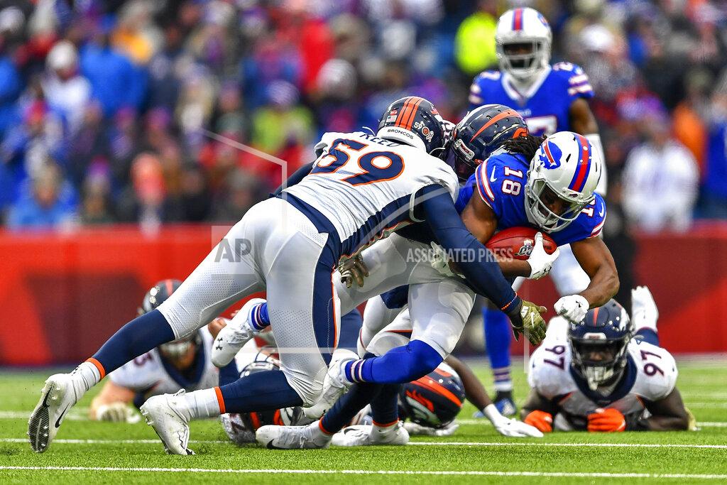 Adrian Kraus Buffalo Bills wide receiver Andre Roberts (18) is tackled by the Denver Broncos during the third quarter of an NFL football game, Sunday, Nov. 24, 2019, in Orchard Park, N.Y. (AP Photo/Adrian Kraus)