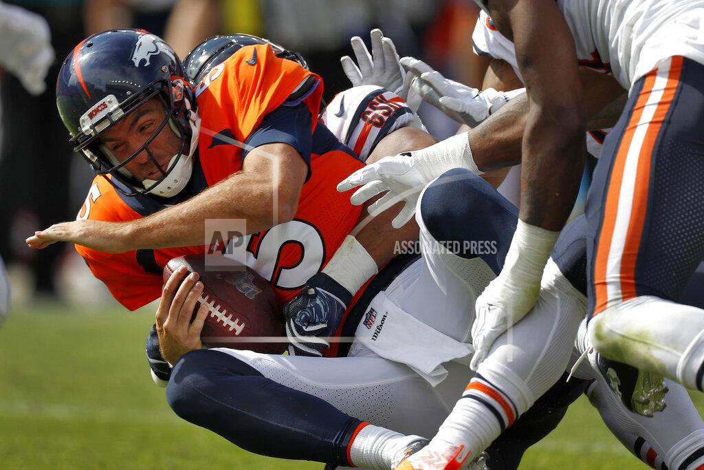 David Zalubowski Denver Broncos quarterback Joe Flacco (5) is sacked by Chicago Bears outside linebacker Khalil Mack during the first half of an NFL football game, Sunday, Sept. 15, 2019, in Denver. (AP Photo/David Zalubowski)