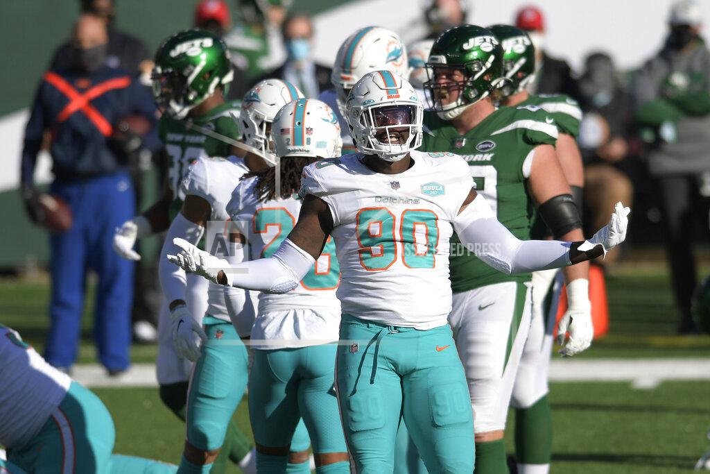 Bill Kostroun Miami Dolphins' Shaq Lawson reacts during the first half of an NFL football game against the New York Jets, Sunday, Nov. 29, 2020, in East Rutherford, N.J. (AP Photo/Bill Kostroun)