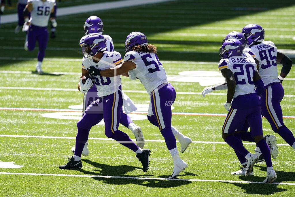 Michael Conroy Minnesota Vikings linebacker Eric Wilson (50) celebrates an interception during the first half of an NFL football game against the Indianapolis Colts, Sunday, Sept. 20, 2020, in Indianapolis. (AP Photo/Michael Conroy)