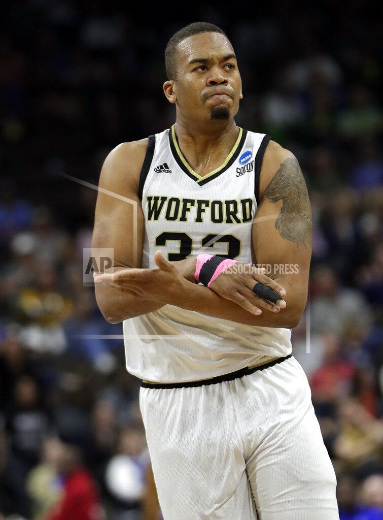 John Raoux Wofford's Cameron Jackson gestures toward the team's bench after making a basket against Seton Hall during the first half of a first-round game in the NCAA men’s college basketball tournament in Jacksonville, Fla., Thursday, March 21, 2019. (AP Photo/John Raoux)