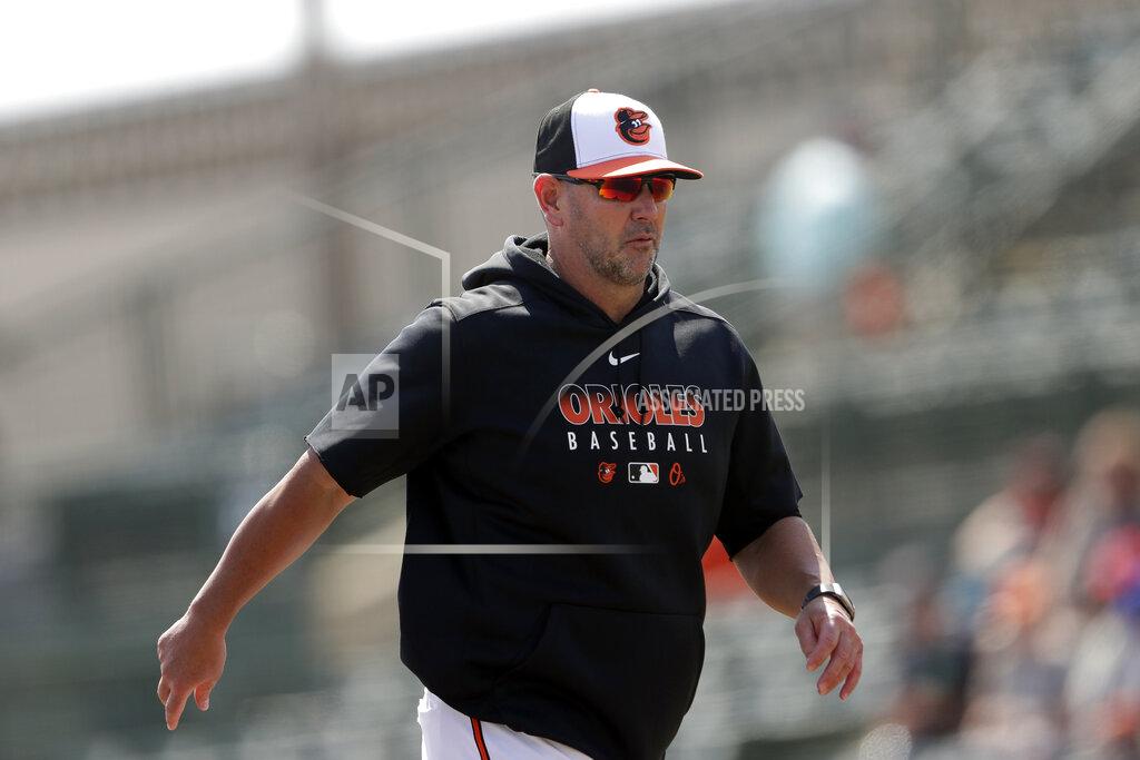 John Bazemore FILE - In this Tuesday, Feb. 25, 2020, file photo, Baltimore Orioles manager Brandon Hyde returns to the dugout after making a pitching changer during a spring training baseball game against the Tampa Bay Rays, in Sarasota, Fla. (AP Photo/John Bazemore, File)
