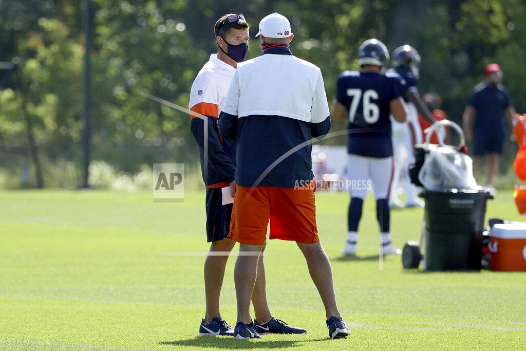 Chicago Bears offensive coordinator Bill Lazor, left, meets with head coach Matt Nagy during NFL football training camp at Halas Hall on Wednesday, Sept. 2, 2020, in Lake Forest, Ill. (Dylan Buell/Pool Photo via AP)