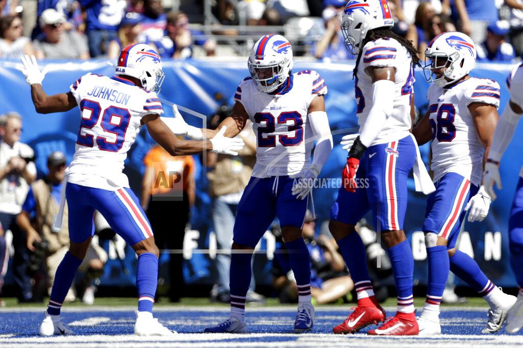 Adam Hunger Buffalo Bills' Micah Hyde (23) celebrates with teammates during the first half of an NFL football game against the New York Giants, Sunday, Sept. 15, 2019, in East Rutherford, N.J. (AP Photo/Adam Hunger)