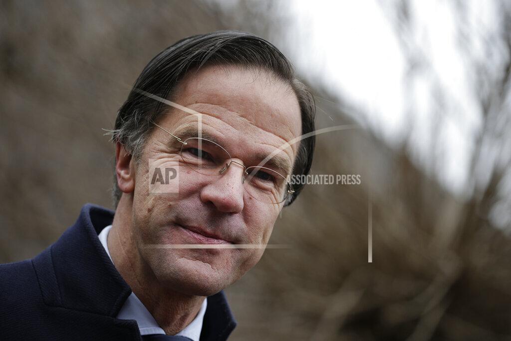 Peter Dejong FILE - In this file photo dated Wednesday, March 17, 2021, Dutch caretaker Prime Minster Mark Rutte answers questions after casting his vote in a general election in The Hague. Rutte announced a significant easing in his country's months-long coronavirus lockdown Tuesday April 20, 2021, calling it a delicate balancing act as infections remain stubbornly high, and as lockdown fatigue grows. (AP Photo/Peter Dejong, FILE)