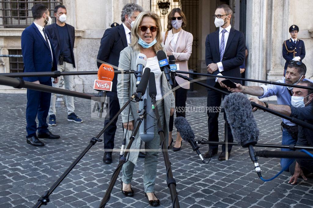 FILE - In this June 12, 2020 file photo, lead prosecutor Maria Cristina Rota talks with reporters as the leaves Palazzo Chigi premier's office, in Rome. Prosecutors from northern Italy have traveled to Rome again Thursday, Jan. 28, 2021, to question the health minister and others as part of their broadening investigation into whether to lay any criminal blame for Italy’s horrific coronavirus toll. Back in June, Bergamo prosecutors questioned Premier Giuseppe Conte, Health Minister Roberto Speranza and other top officials about the delayed lockdown in two Bergamo towns where infections were reported in the early days of Italy’s outbreak. Bergamo subsequently became the Italy’s COVID-19 epicenter, the first in the West, registering a 571% excess mortality rate in March compared to the average of the previous five years. (Roberto Monaldo/LaPresse via AP)