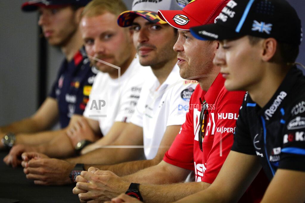From left, Red Bull Racing's French driver Pierre Gasly, Mercedes Finnish driver Valtteri Bottas, McLaren's Spanish driver Carlos Sainz Jr, Ferrari's German driver Sebastian Vettel and Williams' British driver George Russell attend a press conference at the Barcelona Catalunya racetrack in Montmelo, Spain, Thursday, May 9, 2019. The Formula One race will be held on Sunday. (AP Photo/Manu Fernandez)