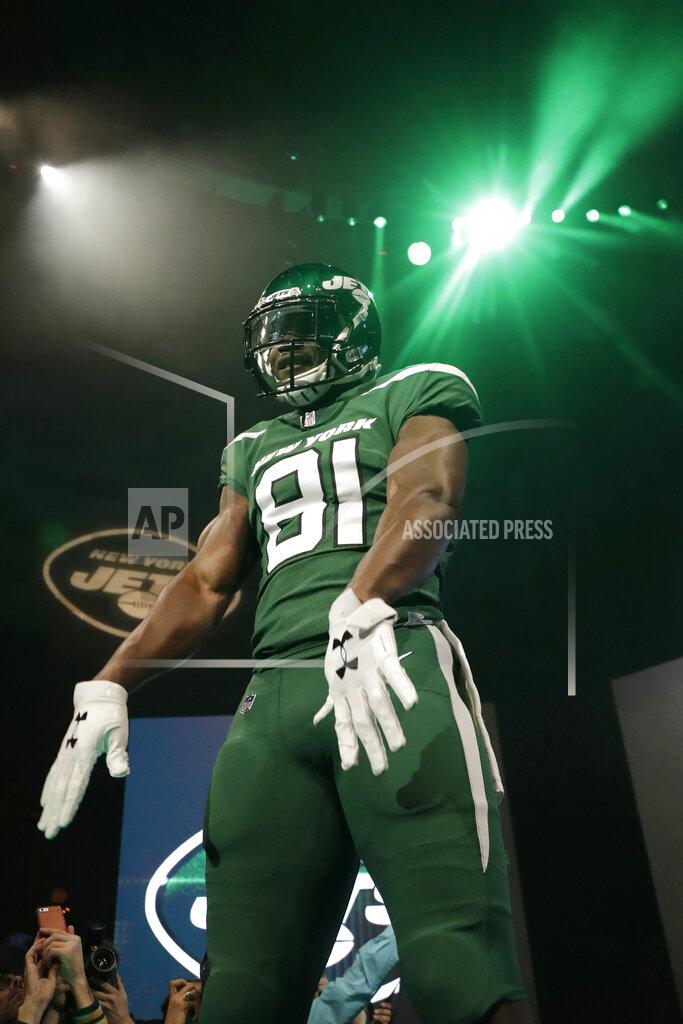 Julio Cortez New York Jets wide receiver Quincy Enunwa models the NFL football team's new "Gotham green" uniform Thursday, April 4, 2019, in New York. (AP Photo/Julio Cortez)
