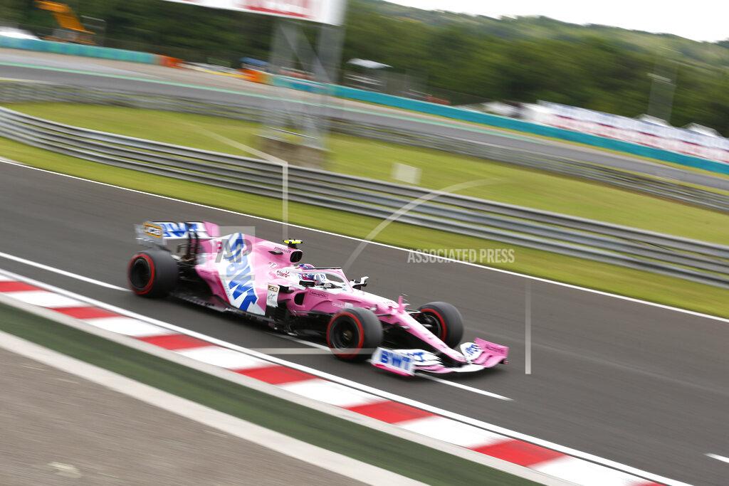 Darko Bandic Racing Point driver Lance Stroll of Canada steers his car during the qualifying session for the Hungarian Formula One Grand Prix at the Hungaroring racetrack in Mogyorod, Hungary, Saturday, July 18, 2020. The Hungarian F1 Grand Prix will be held on Sunday. (Darko Bandic/Pool)