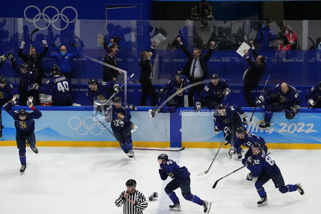 Jae C. Hong Finland celebrates defeating the Russian Olympic Committee in the men's gold medal hockey game at the 2022 Winter Olympics, Sunday, Feb. 20, 2022, in Beijing. (AP Photo/Jae C. Hong)