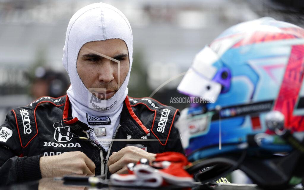 Matt Slocum FILE - In this Aug. 18, 2018, file photo, Robert Wickens prepares to qualify for an IndyCar series auto race in Long Pond, Pa. Nearly a year after his devastating injury in an IndyCar race, Wickens will indeed get to drive a car again at a race track. He will lead the parade lap Sunday before the Toronto IndyCar race in an Acura NSX equipped with hand controls.. (AP Photo/Matt Slocum, File)