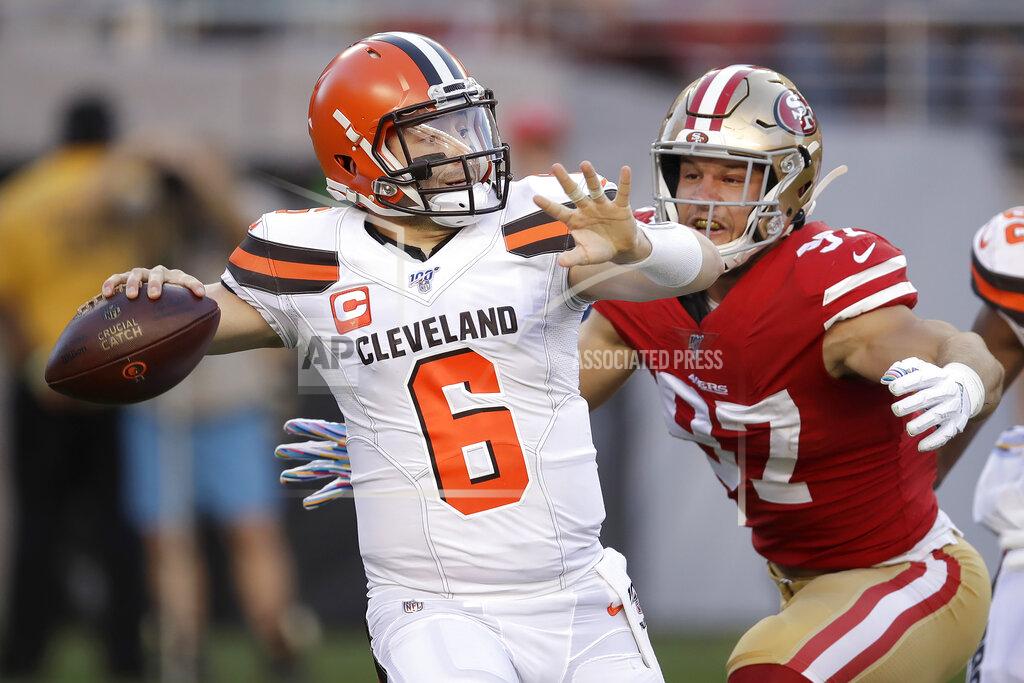 Ben Margot Cleveland Browns quarterback Baker Mayfield (6) passes as San Francisco 49ers defensive end Nick Bosa applies pressure during the first half of an NFL football game in Santa Clara, Calif., Monday, Oct. 7, 2019. (AP Photo/Ben Margot)