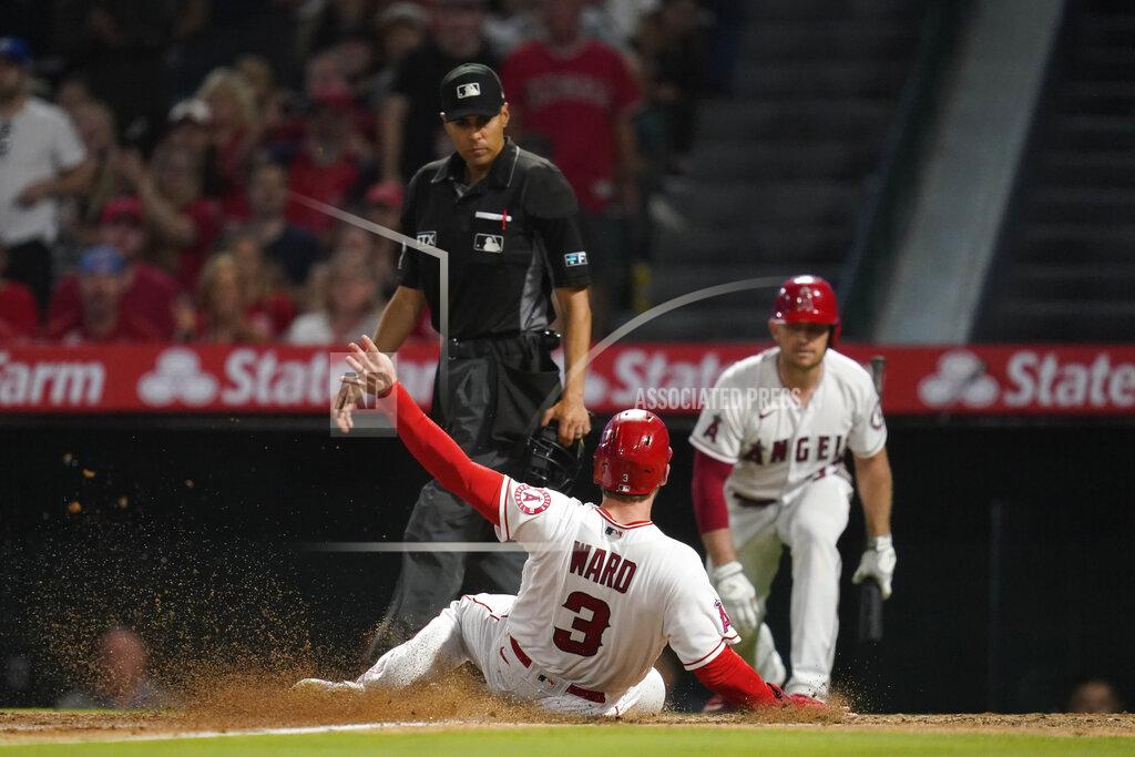 Ashley Landis Los Angeles Angels' Taylor Ward (3) slides in to home to score off of a sacrifice fly hit by David MacKinnon during the fifth inning of a baseball game against the Kansas City Royals in Anaheim, Calif., Wednesday, June 22, 2022. (AP Photo/Ashley Landis)