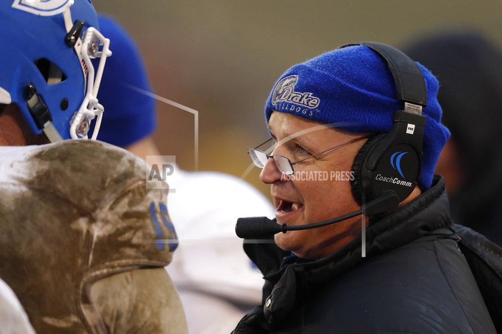 Charlie Neibergall Drake head coach Rick Fox talks with quarterback Grant Kraemer, left, during the second half of an NCAA college football game against Iowa State, Saturday, Dec. 1, 2018, in Ames, Iowa. Iowa State won 27-24. (AP Photo/Charlie Neibergall)