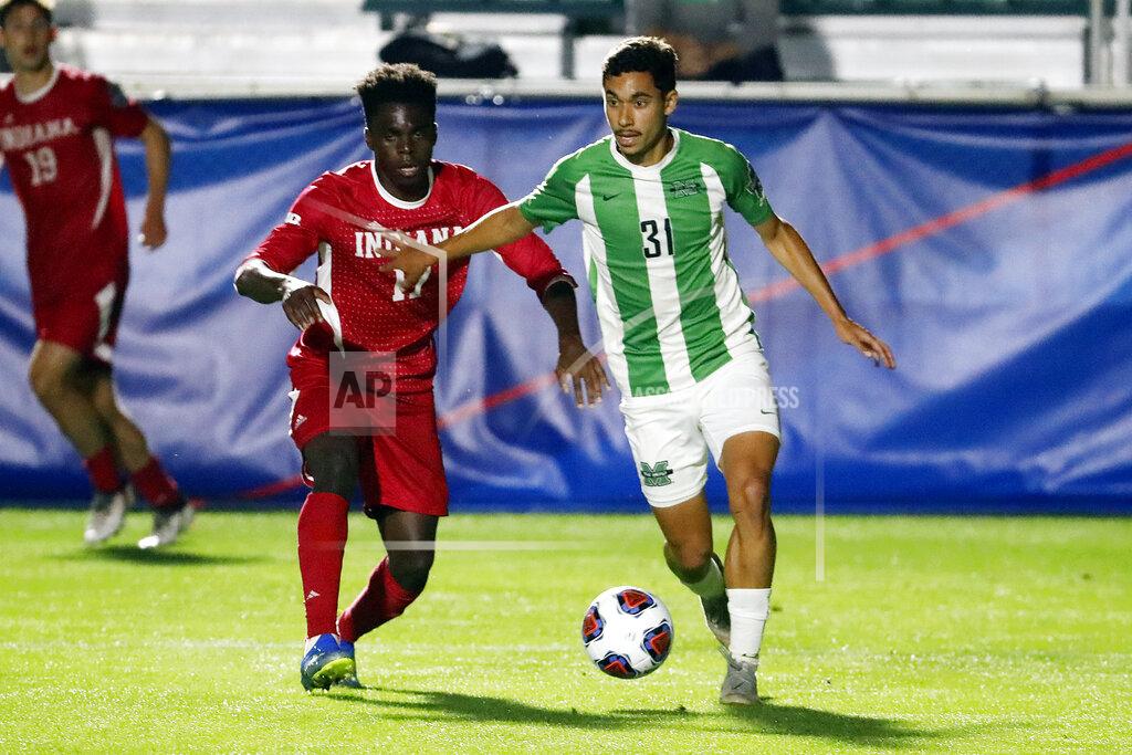 Karl B Deblaker Marshall's Vitor Dias (31) controls the ball in front of Indiana's Herbert Endeley (17) during the first half of the NCAA College Cup championship soccer match in Cary, N.C., Monday, May 17, 2021. (AP Photo/Karl B DeBlaker)