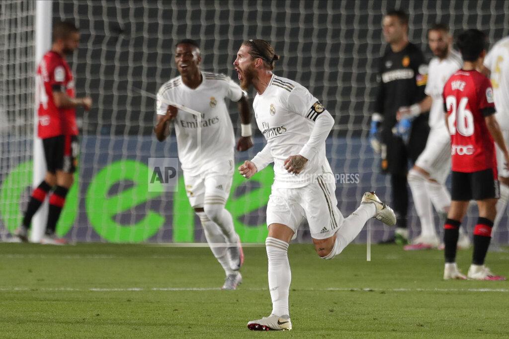 Bernat Armangue Real Madrid's Sergio Ramos celebrates after scoring his side's second goal during the Spanish La Liga soccer match between Real Madrid and Mallorca at Alfredo di Stefano stadium in Madrid, Spain, Wednesday, June 24, 2020. (AP Photo/Bernat Armangue)