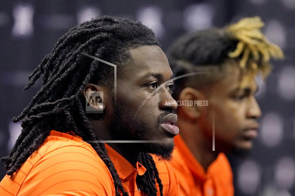 Charlie Riedel Oklahoma State's Isaac Likekele Jr., left, and Rondel Walker speak to the media during Big 12 NCAA college basketball media day Wednesday, Oct. 20, 2021, in Kansas City, Mo. (AP Photo/Charlie Riedel)