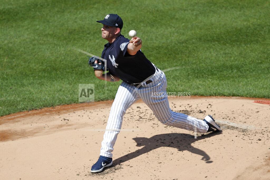 Kathy Willens FILE - In this July 5, 2020, file photo, New York Yankees starting pitcher James Paxton throws from the mound during a baseball summer training camp workout at Yankee Stadium in New York. Nothing changes the New York Yankees' mission, not the novel coronavirus, not a 60-game regular season. Winning the World Series is the sole focus.(AP Photo/Kathy Willens, File)