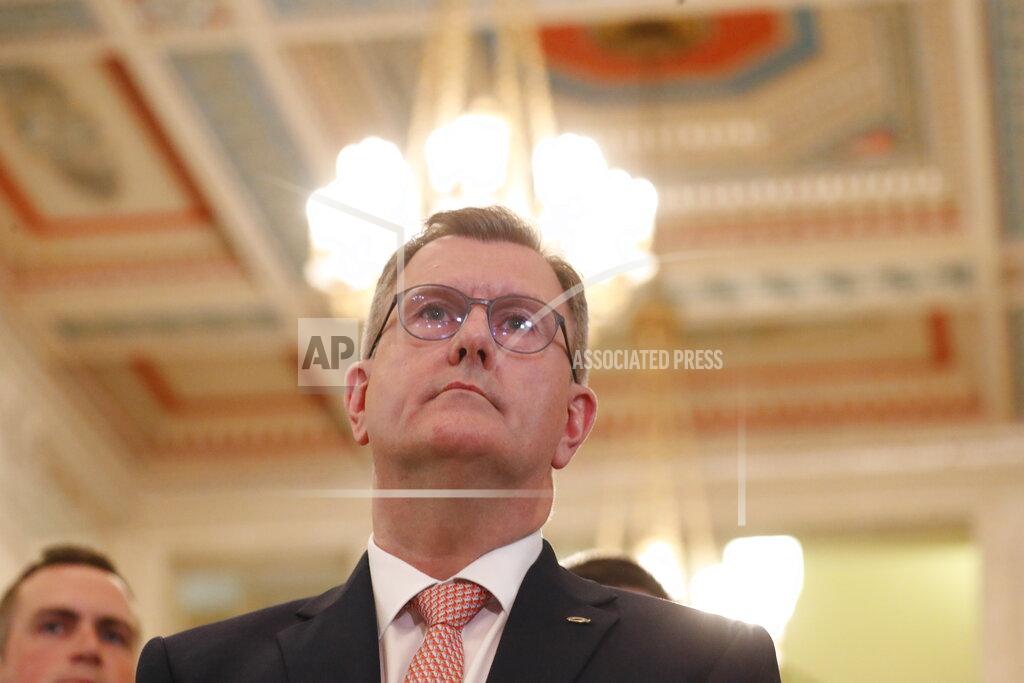 Peter Morrison FILE - Democratic Unionist Party leader Jeffrey Donaldson pauses as he speaks to the media at Parliament Buildings, Stormont, Belfast, Monday, May 9, 2022. U.S. House Speaker Nancy Pelosi is facing criticism from the leader of Northern Ireland’s biggest unionist party after saying Congress won’t approve a trade deal with the U.K. if Britain scraps the agreement governing post-Brexit trade on the island. (AP Photo/Peter Morrison, File)