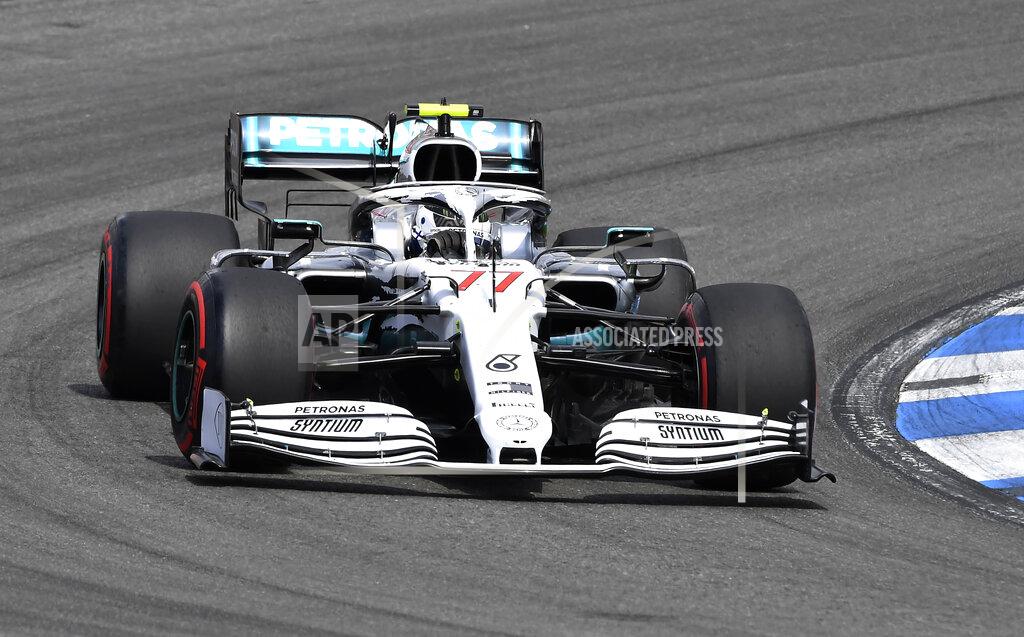 FILE - In this file photo dated Saturday, July 27, 2019, Mercedes driver Valtteri Bottas of Finland steers his car during the qualifying Formula One session at the Hockenheimring racetrack in Hockenheim, Germany. Mercedes has a point to prove at upcoming weekend’s Hungarian Grand Prix, especially Valtteri Bottas after his crash at the German GP. (AP Photo/Jens Meyer, FILE)