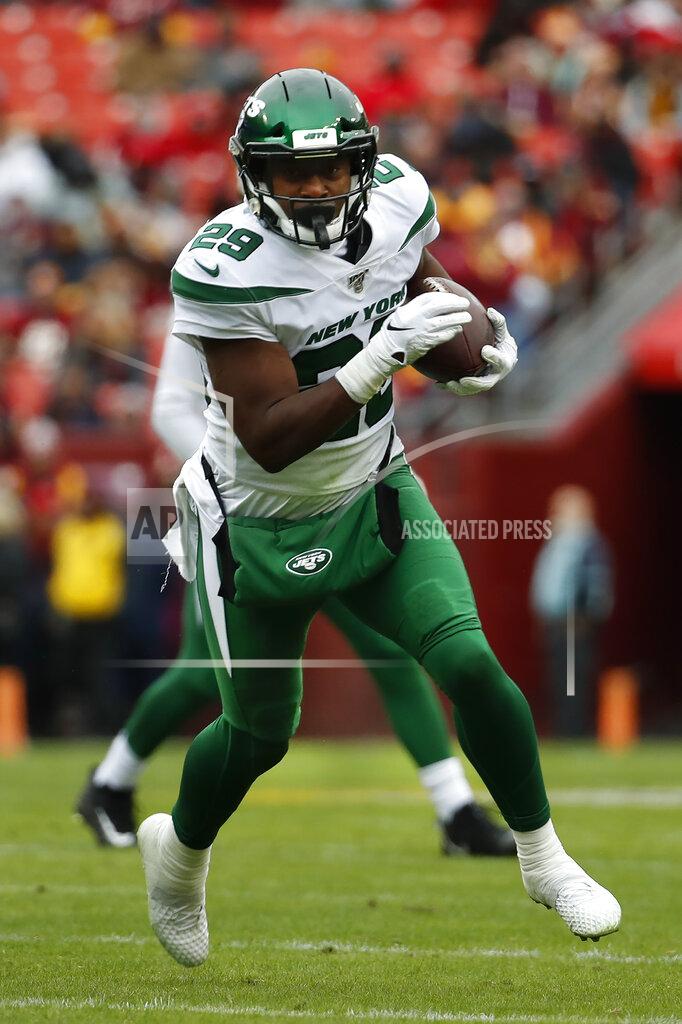 Alex Brandon New York Jets running back Bilal Powell (29) runs with the ball against the Washington Redskins in the first half of an NFL football game, Sunday, Nov. 17, 2019, in Landover, Md. (AP Photo/Alex Brandon)