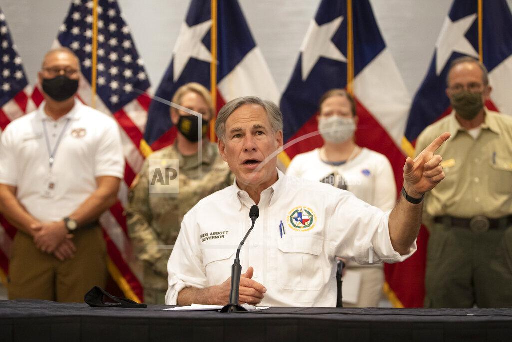 Jay Janner Gov. Greg Abbott talks about Hurricane Laura at the alternate State Operations Center at the Doubletree Hotel in Austin, Texas, on Tuesday August 25, 2020. (Jay Janner/Austin American-Statesman via AP)