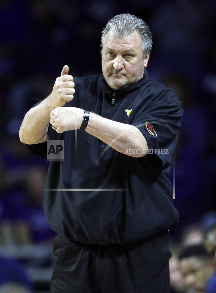 Orlin Wagner West Virginia coach Bob Huggins calls a play during the first half of the team's NCAA college basketball game against Kansas State in Manhattan, Kan., Wednesday, Jan. 9, 2019. (AP Photo/Orlin Wagner)