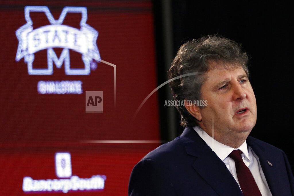 Rogelio V. Solis FILE - In this Jan. 10, 2020 file photo, Mississippi State NCAA college football coach Mike Leach speaks at a news conference at the Starkville, Miss., based university, after being officially introduced as the head coach. The coronavirus pandemic has shut down much of Division I football, but with three of the Power Five leagues still playing, there are still some big games to look forward to. Mississippi State will verse Mississippi on Nov. 28, 2020. (AP Photo/Rogelio V. Solis, File)