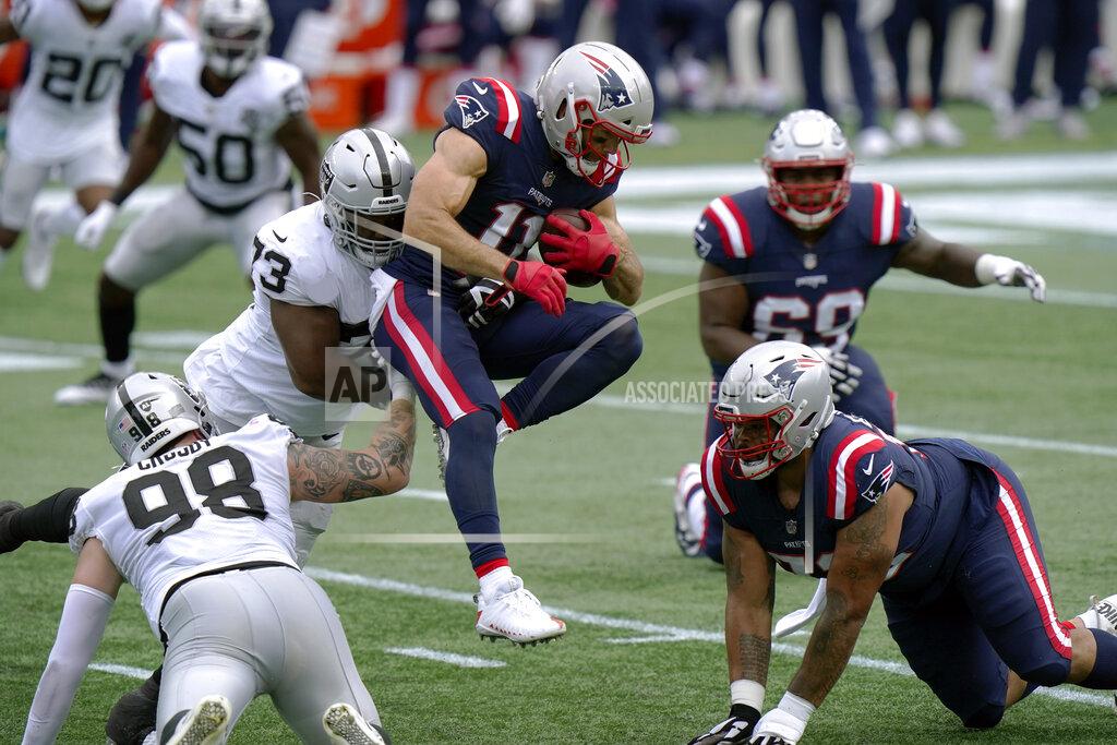 Steven Senne Las Vegas Raiders defensive lineman Maurice Hurst (73) tackles New England Patriots wide receiver Julian Edelman (11) in the first half of an NFL football game, Sunday, Sept. 27, 2020, in Foxborough, Mass. (AP Photo/Steven Senne)