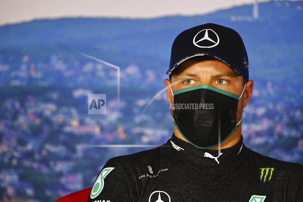 Mark Sutton Mercedes driver Valtteri Bottas of Finland talks during a press conference after the qualifying session for the Hungarian Formula One Grand Prix at the Hungaroring racetrack in Mogyorod, Hungary, Saturday, July 18, 2020. The Hungarian F1 Grand Prix will be held on Sunday. (Mark Sutton/Pool Via AP)