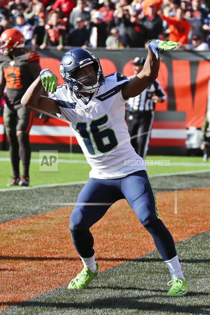 Ron Schwane Seattle Seahawks wide receiver Tyler Lockett celebrates after a 16-yard touchdown during the second half of an NFL football game against the Cleveland Browns, Sunday, Oct. 13, 2019, in Cleveland. (AP Photo/Ron Schwane)
