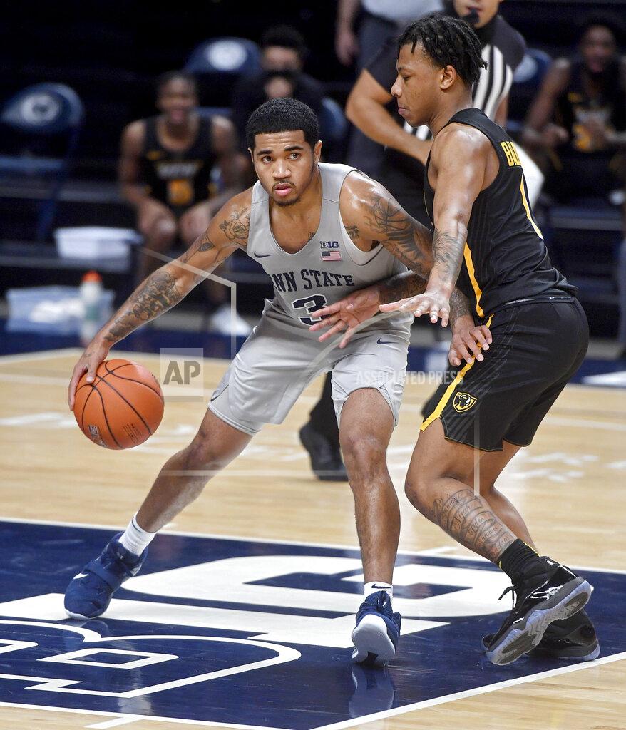 Abby Drey Penn State's Sam Sessoms dribbles around VCU's Adrian Baldwin Jr. during an NCAA college basketball game Wednesday, Dec. 2, 2020, in State College, Pa. (Abby Drey/Centre Daily Times via AP)