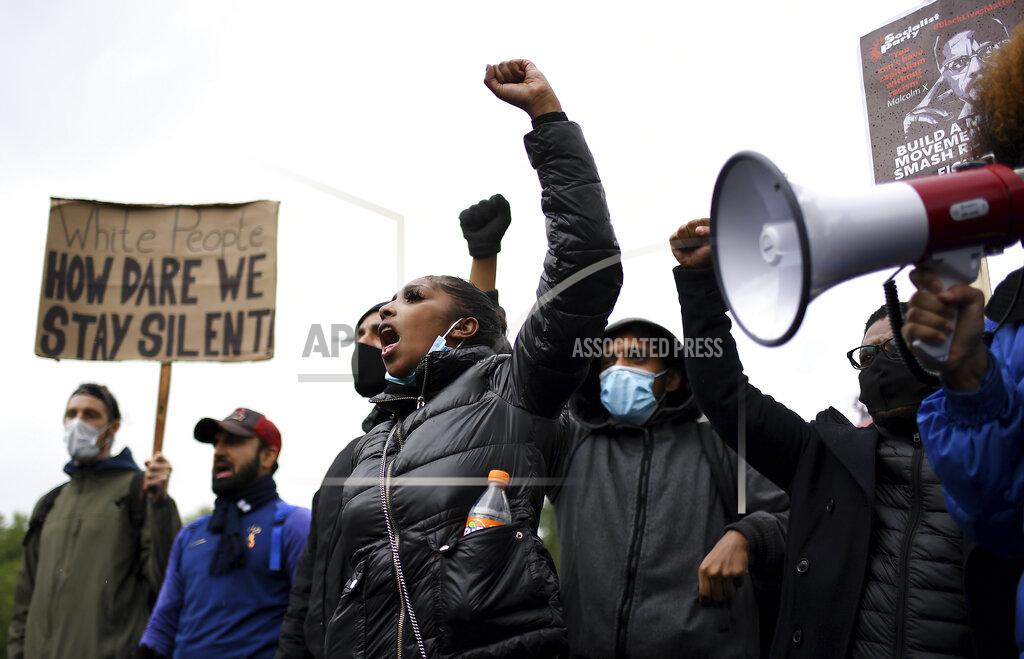 Alberto Pezzali Protestors shout in Hyde Park during protests in London, Friday, June 12, 2020 in response to the recent killing of George Floyd by police officers in Minneapolis, USA, that has led to protests in many countries and across the US.(AP Photo/Alberto Pezzali)