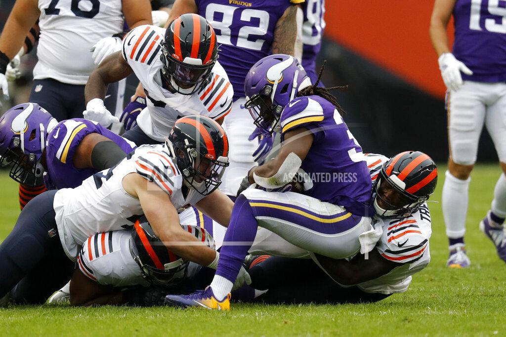Charles Rex Arbogast Members of the Chicago Bears defense stops Minnesota Vikings running back Dalvin Cook during the half of an NFL football game Sunday, Sept. 29, 2019, in Chicago. (AP Photo/Charles Rex Arbogast)