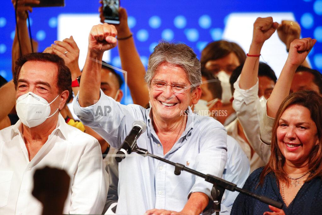 Angel Dejesus Guillermo Lasso, presidential candidate of Creating Opportunities party, CREO, speaks to supporters after a presidential runoff election at his campaign headquarters in Guayaquil, Ecuador, Sunday, April 11, 2021. With most of the votes counted Lasso, a former banker, had a lead over economist Andres Arauz, a protege of former President Rafael Correa.(AP Photo/Angel Dejesus)
