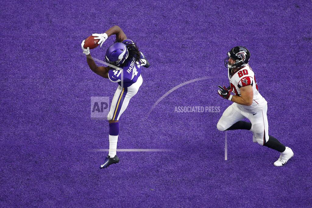 Bruce Kluckhohn Minnesota Vikings defensive back Anthony Harris (41) intercepts a pass intended for Atlanta Falcons tight end Luke Stocker in the end zone during the second half of an NFL football game, Sunday, Sept. 8, 2019, in Minneapolis. (AP Photo/Bruce Kluckhohn)