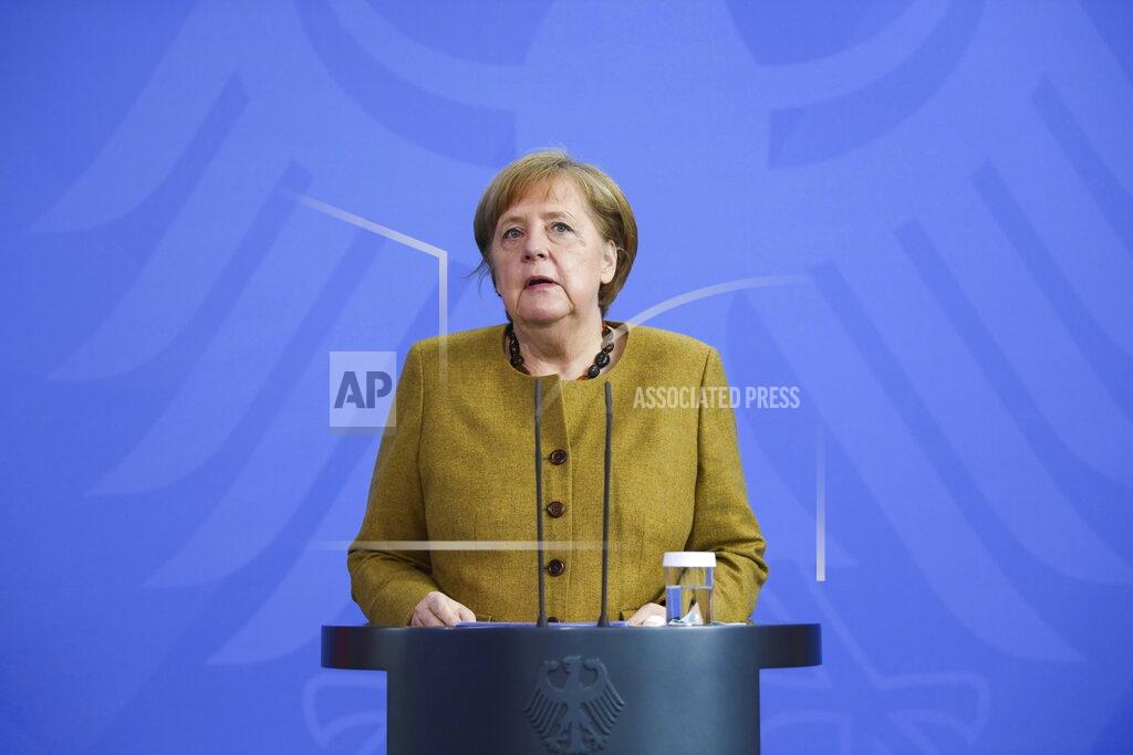 German Chancellor Angela Merkel speaks at a press conference in Berlin, Germany, Tuesday, April 13, 2021. The Chancellor spoke about the current situation in the Corona pandemic and the amendments to the Infection Protection Act that the Federal Government passed on Tuesday. (Annegret Hilse/AP via Pool)