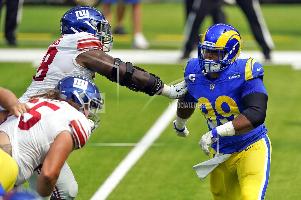 Ashley Landis Los Angeles Rams defensive end Aaron Donald, right, works against the New York Giants during the first half of an NFL football game Sunday, Oct. 4, 2020, in Inglewood, Calif. (AP Photo/Ashley Landis)