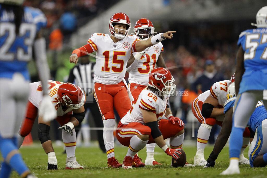 Marcio Jose Sanchez Kansas City Chiefs quarterback Patrick Mahomes (15) gestures before starting a play during the first half of an NFL football game against the Los Angeles Chargers, Monday, Nov. 18, 2019, in Mexico City. (AP Photo/Marcio Jose Sanchez)