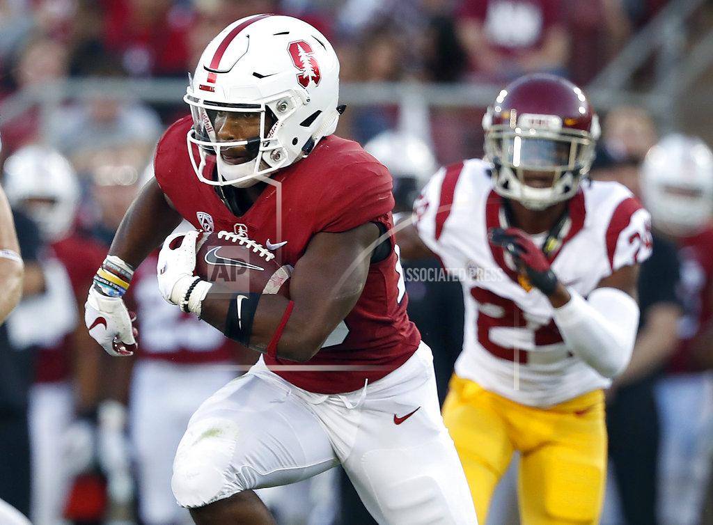 Tony Avelar FILE - In this Saturday, Sept. 8, 2018, file photo, Stanford running back Bryce Love (20) rushes against Southern California during the first half of an NCAA college football game in Stanford, Calif. A couple of Pac-12 stars have a chance to put themselves into the Heisman mix on Saturday night when No. 7 Stanford visits No. 20 Oregon. Love, last year’s Heisman runner-up behind Sooners quarterback Baker Mayfield, is already way behind the field in the Heisman race, but the speedster can make up ground in a nationally televised night game. (AP Photo/Tony Avelar, File)
