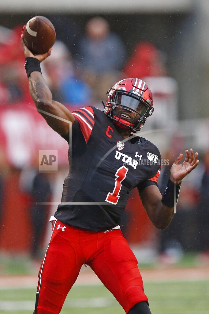 Rick Bowmer Utah quarterback Tyler Huntley throws a pass during the first half of an NCAA college football game against Arizona State on Saturday, Oct. 19, 2019, in Salt Lake City. (AP Photo/Rick Bowmer)