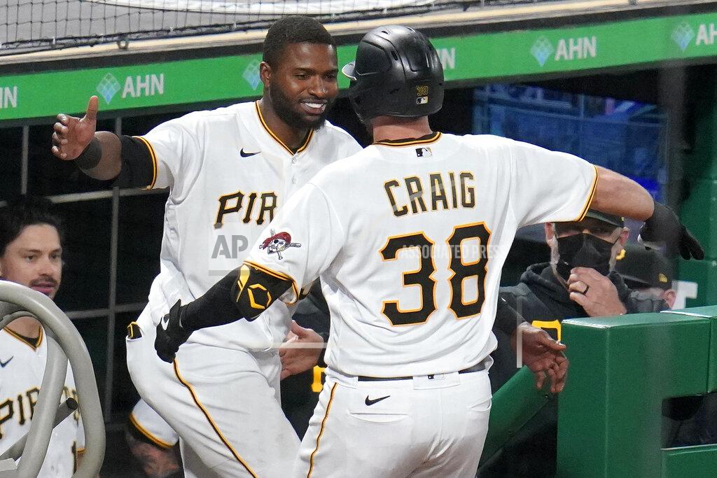 Gene J. Puskar Pittsburgh Pirates' Will Craig (38) is greeted at the dugout steps by Gregory Polanco after getting his first major league hit, a solo home run, off San Francisco Giants relief pitcher Camilo Doval during the eighth inning of a baseball game in Pittsburgh, Thursday, May 13, 2021.(AP Photo/Gene J. Puskar)